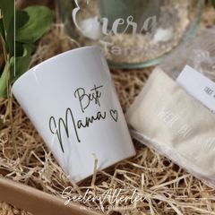 Geschenkset für eine Mama bestehend aus einer Tasse mit der aufschrift beste Mama, einem Augenrelaxkissen mit leinsamengefüllt in einer Geschenkschachtel