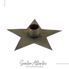 Nahaufnahme Kerzenständer in Sternform aus messing von IBlaursen vor weißem Hintergrund