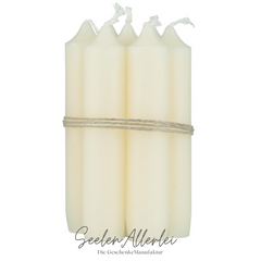 cremefarbene Kerzen als Produktfoto vor weißem Hintergrund