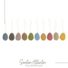 alle 10 Farben der gehäkelten Ostereier sind vor weißem hintergrund abgebildet
