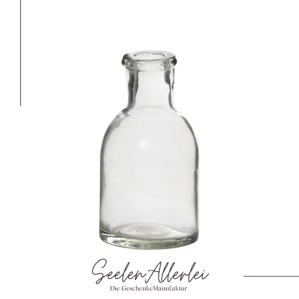 Apothekerglas klar klein als Detailaufnahme auf weißem Hintergrund