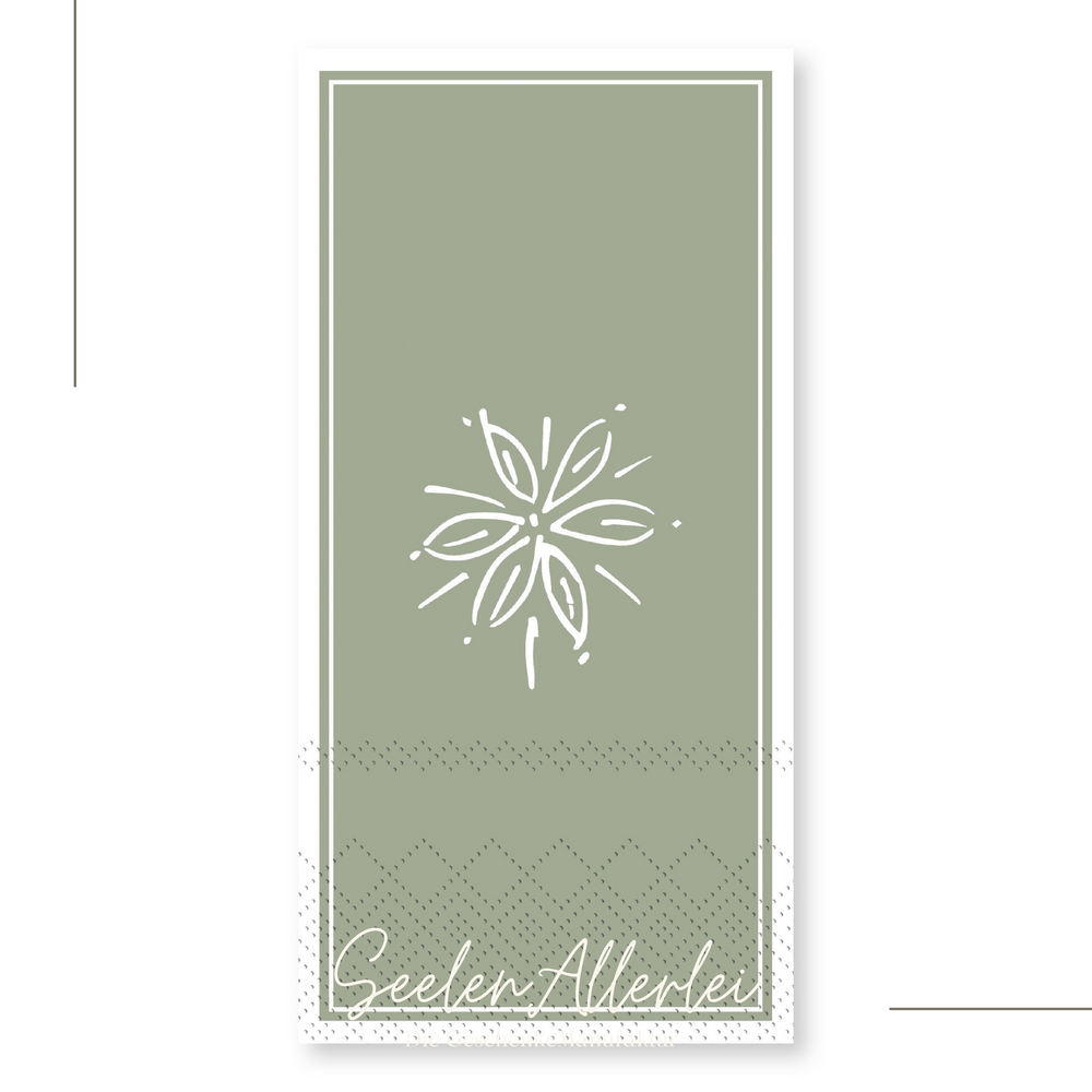 Serviette grün vor weißem Hintergrund