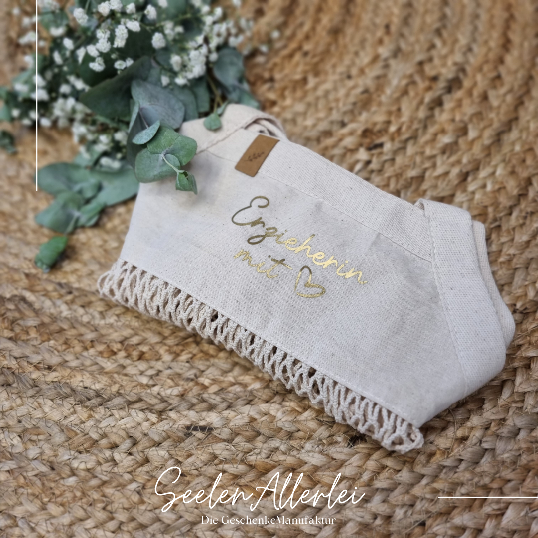 Einkaufsbeutel Netztasche mit der Aufschrift Erzieherin mit Herz in goldener Schrift