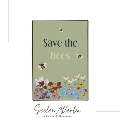 Save the bees metallschild vor weißem Hintergrund