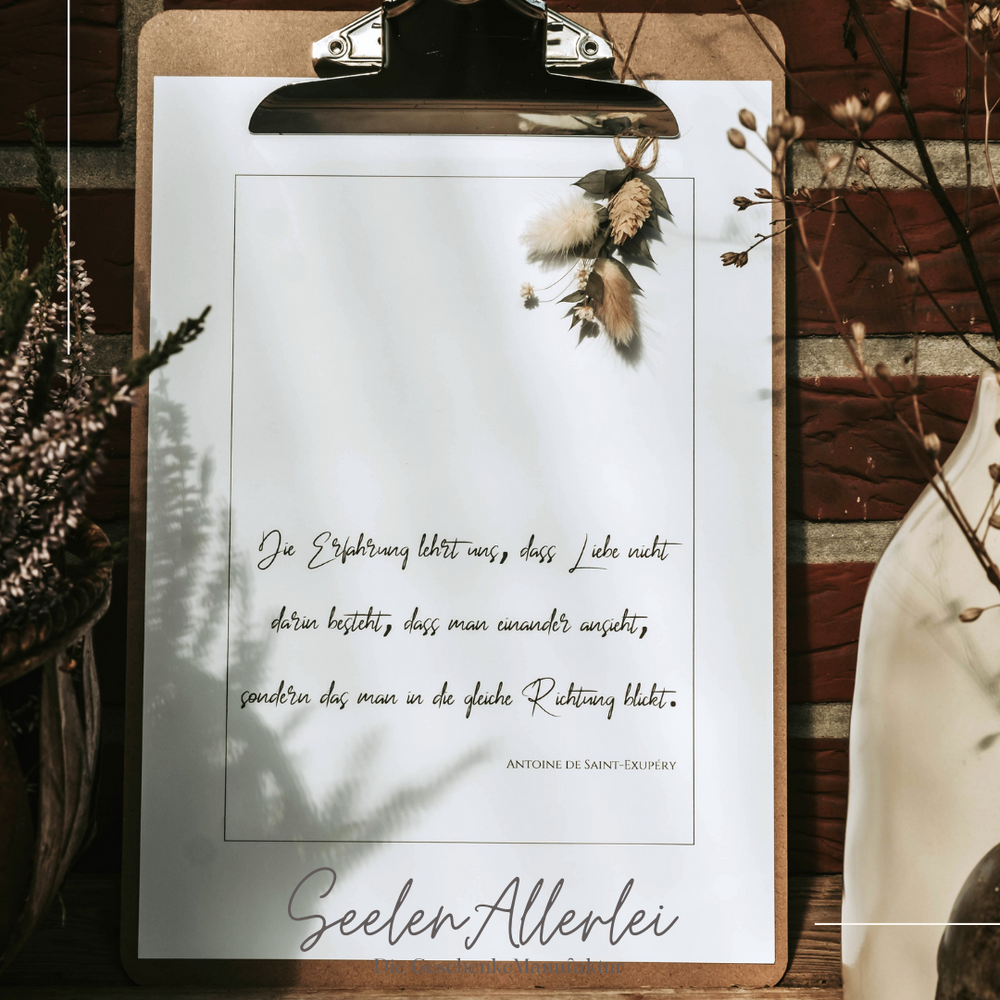 Text Antoine de Saint-Excupéry Kunstdruck im Klemmbrett